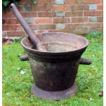 A LARGE ANTIQUE, POSSIBLY 18TH CENTURY, CAST IRON PESTLE AND MORTAR the pestle 61cm long, the mortar