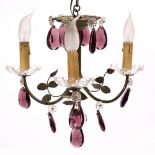 A 20TH CENTURY GILT METAL THREE BRANCH LIGHT FIXTURE with cut crystal droppers and tear drop