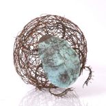 FIONA CAMPBELL A contemporary copper sculpture of a dung beetle and the product of it's labours,