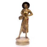 AFTER FERDINAND PREISS, GIRL AND TAMBOURINE, gilt spelter, on a circular onyx base, 27cm in height