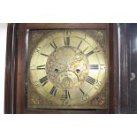 AN ANTIQUE 30-HOUR LONG CASE CLOCK the brass dial and Arabic and Roman numerals and a date aperture,