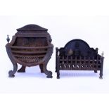 A GEORGIAN STYLE CAST IRON FIRE GRATE with urn finials, 55cm wide x 32cm deep and a further cast