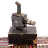 AN ERNST PLANK 'THE STANDARD' MAGIC LANTERN complete with carrying box and with a number of Magic