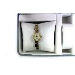 A ROTARY LADIES 9CT GOLD BRACELET WATCH the dial 1.6cm wide