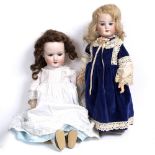 AN ARMAND MARSEILLE BISQUE HEADED DOLL stamped 390n and number 7, 54cm high overall (restoration