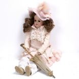 AN ARMAND MARSEILLE BISQUE HEADED DOLL the reverse stamped 370 and numbered 01/2 with a kid