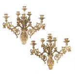 A PAIR OF GILT BRASS GOTHIC REVIVAL FIVE BRANCH SIX LIGHT WALL SCONCES with stylised leaf