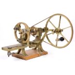 A 20TH CENTURY BRASS LACQUERED WATCH MAKERS LATHE mounted on a wooden plinth, marked J & T