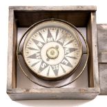 A 19TH CENTURY GIMBALLED SHIP'S COMPASS with a dry compass card, and a painted pine case,