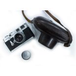 A 1955 LEICA M3 CAMERA serial number 754168 with a Summicron F=5cm 1:2 Nr 1233348 lens, lens cap and