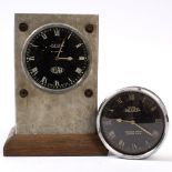 TWO JAEGER CAR CLOCKS with black enamel dials and Arabic numerals, the largest 17cm x 12cm x 7cm (