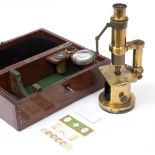 A LATE 19TH / EARLY 20TH CENTURY BRASS LACQUERED MICROSCOPE unsigned but with numerous stamped