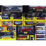 A QUANTITY OF DIE CAST VEHICLES to include a number manufactured by Burago