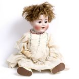 AN ANTIQUE ALT, BECK & GOTTSCHALCK BISQUE HEADED DOLL with stamped monogram to the reverse of the