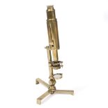 A 19TH CENTURY BRASS COMPOUND MICROSCOPE signed 'Improved Compound Microscope by T.B. Matthews, 9