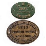 A CAST IRON GWR 2671 4000 GALLON SWINDON TANKER PLATE on green ground, 20cm across, and a cast metal