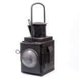 A 20TH CENTURY BLACK PAINTED RAILWAY HAND HELD LANTERN OR LOCOMOTIVE HEADLAMP marked BR(W), 50cm