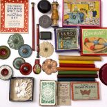 A SELECTION OF VINTAGE GAMES AND TOYS to include wheel spinners, vintage yo-yo, hand wound diorama