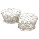 A PAIR OF WIREWORK CIRCULAR BASKETS each 46cm diameter x 24cm high (2)