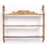 A SET OF PARCEL GILT HANGING WALL SHELVES decorated with masks, 82cm wide x 16.5cm deep x 75.5cm
