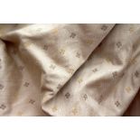 A PAIR OF LINEN FABRIC CURTAINS on a cream ground with repeating pattern (fully lined), a pair,