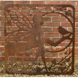 A PIERCED STEEL ORNAMENT in the form of a fairy perched on a branch opposite a bird, 96cm wide x