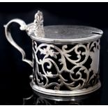 A MID VICTORIAN SILVER DRUM MUSTARD, the sides pierce decorated with scrolling foliage, the engraved
