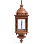 A PAINTED HANGING FOUR GLASS LANTERN with carved decoration and outset barley twist columns, 20cm