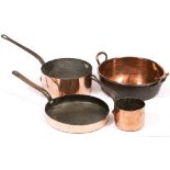 FOUR PIECES OF COPPERWARE consisting of a twin handles jam pan, 43cm approximately and three