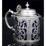 A MID VICTORIAN SILVER TANKARD MUSTARD, the sides with panels of pierced decoration, having domed
