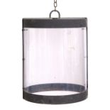 A WROUGHT IRON BLACK PAINTED CYLINDRICAL HALL LANTERN with perspex glazing 31cm diameter x 38cm high