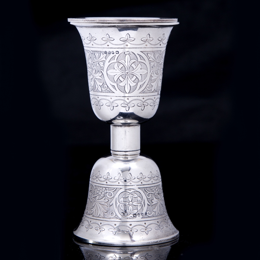 A VICTORIAN SILVER TRAVELLING COMMUNION CHALICE AND PATTERN with chased and engraved foliate