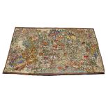 AN INDIAN NEEDLEWORK RECTANGULAR TAPESTRY PANEL with polychrome decoration of birds and animals in a
