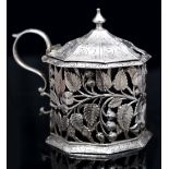 AN EARLY VICTORIAN SILVER TANKARD MUSTARD, of octagonal section, the sides pierced and cast with
