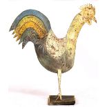 A FOLK ART PAINTED TIN COCKEREL 85cm wide x 97cm high