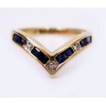 A 9CT GOLD SAPPHIRE SET DRESS RING