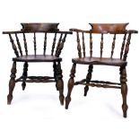 TWO 19TH CENTURY ASH AND ELM CAPTAIN'S CHAIRS each with turned supports, the largest 70cm wide at