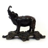 A LATE 19TH / EARLY 20TH CENTURY BRONZE CLOCK STAND in the form of an elephant, 32cm wide x 24cm