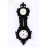 A 19TH CENTURY BLACK PAINTED CAST IRON WALL HANGING CLOCK, THERMOMETER AND BAROMETER the case with