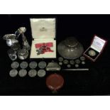 A SILVER CAPSTAN INKWELL, commemorative crowns, a small silver cream jug, pierced silver box,