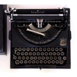 A VINTAGE CASED IMPERIAL TYPEWRITER with accessories