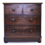 A 19TH CENTURY MAHOGANY TWO OVER TWO DRAWER CHEST on plinth base terminating in bun feet, 92cm x