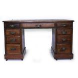 A VICTORIAN MAHOGANY PEDESTAL DESK with a green leather inset top 122cm wide x 60cm deep x 64cm high