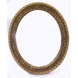 A 20TH CENTURY GILT PAINTED OVAL WALL MIRROR 74cm