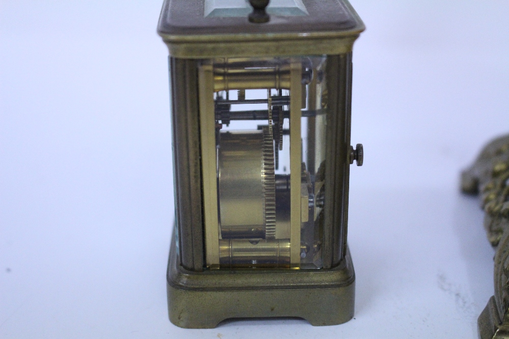 A LATE 19TH / EARLY 20TH CENTURY MINIATURE BRASS CARRIAGE TIMEPIECE 7cm in height x 5cm wide in a - Image 2 of 3