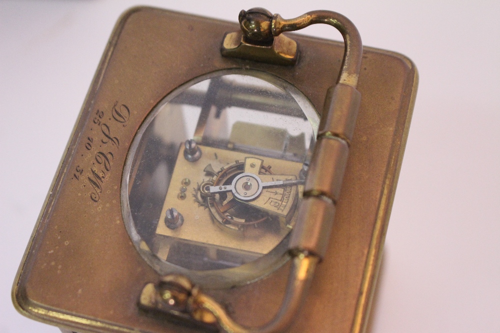 AN EARLY 20TH CENTURY BRASS CASED CARRIAGE CLOCK with white enamel dial and black Arabic numerals, - Image 5 of 5