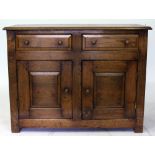 A CONTEMPORARY OAK SIDEBOARD in the manner of 'Bright's of Nettlebed' with panelled sides and