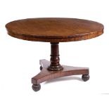 A WILLIAM IV MAHOGANY CIRCULAR TILT TOP BREAKFAST TABLE with turned column support, triform base and