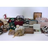 A LARGE SELECTION OF COSTUME JEWELLERY to include clip on earrings, bracelets, necklaces,