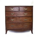 A GEORGIAN STYLE OAK TWO OVER THREE DRAWER CHEST standing on splayed bracket feet, 107cm x 109cm x